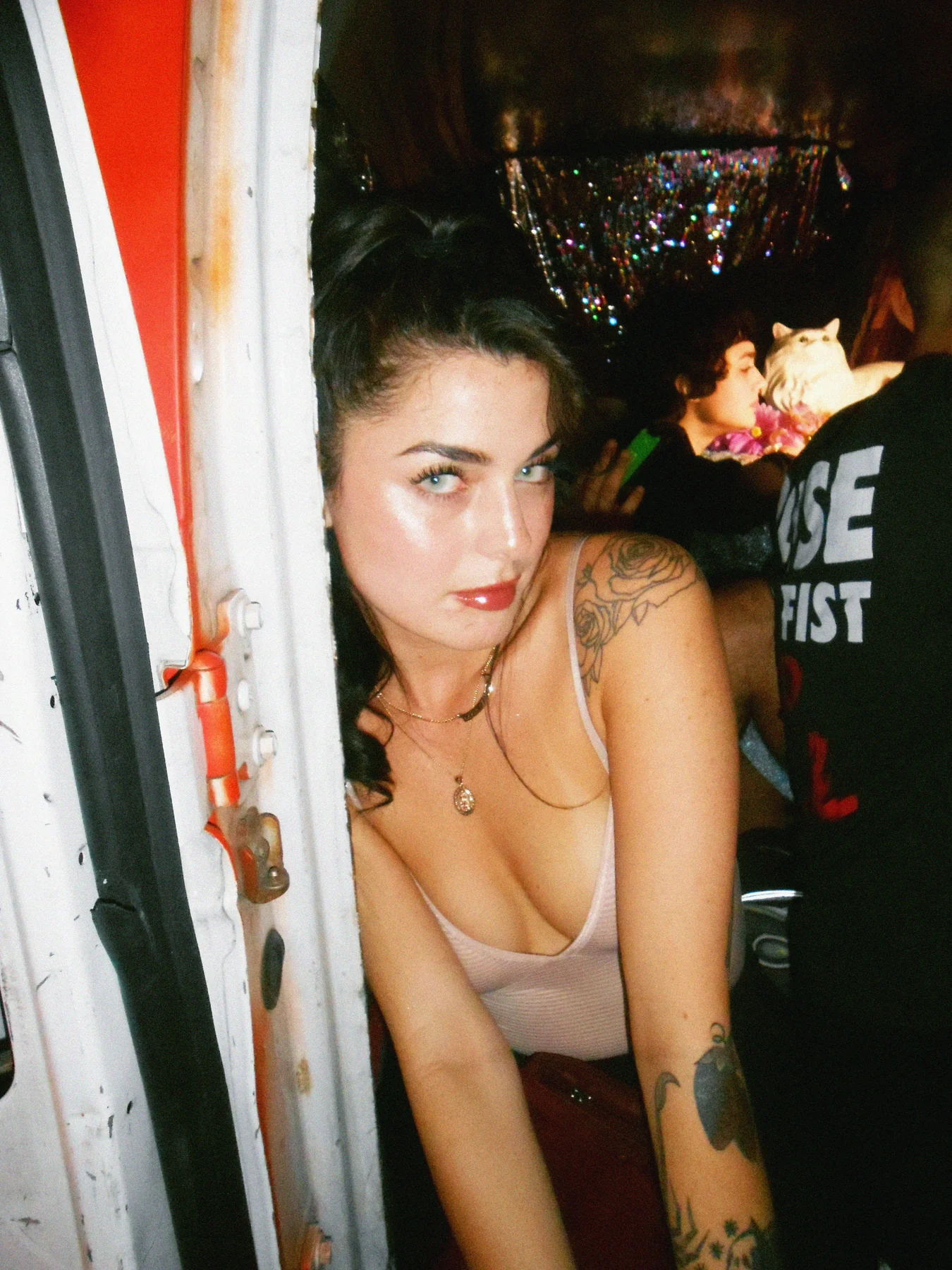 Flash-lit nightlife portrait from the BLUR DIGITAL visual archive